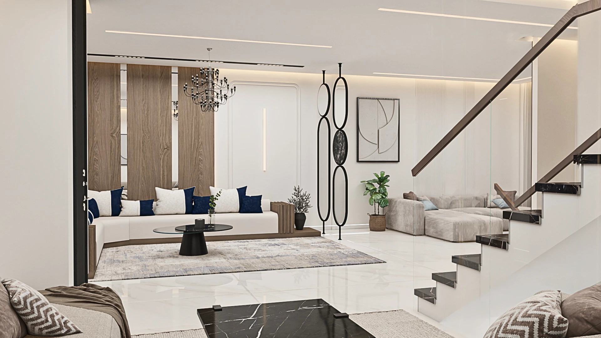 Minimalist living room design at Achakar Gardens with neutral tones, integrated lighting, and contemporary furniture.